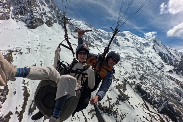 Paragliding baptism facing Mont Blanc