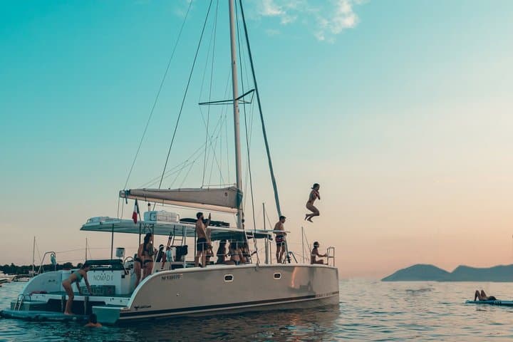 Half-day catamaran tour with paddleboarding