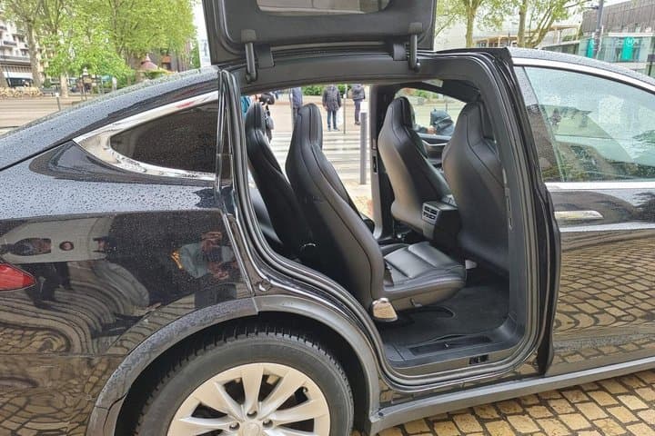 Tesla airport transfer to Paris