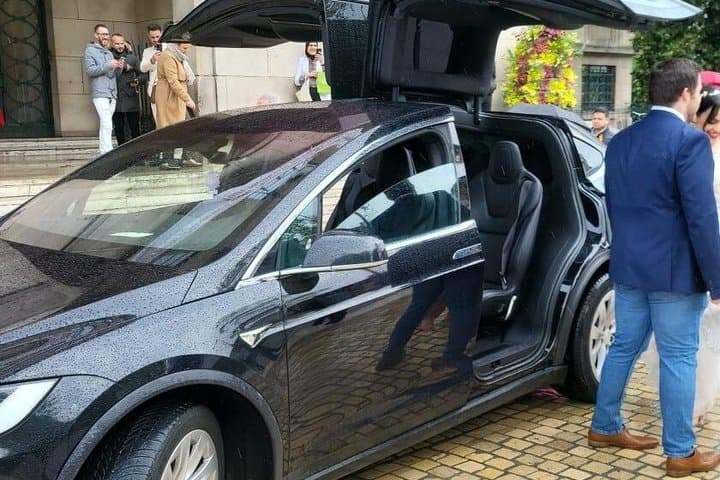 Tesla airport transfer to Paris