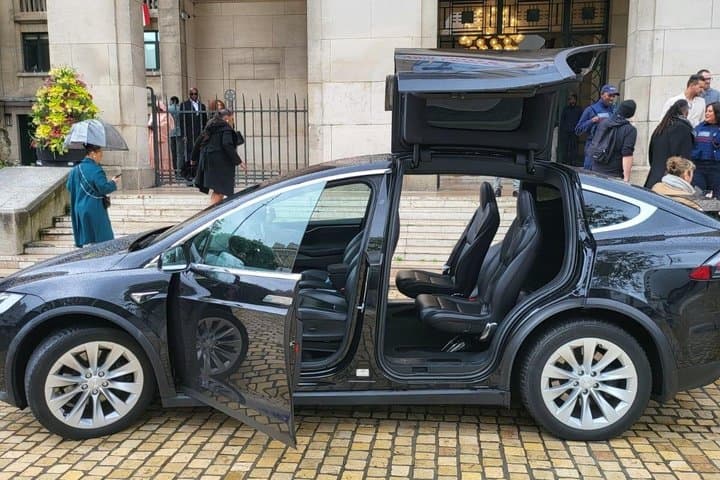 Tesla airport transfer to Paris